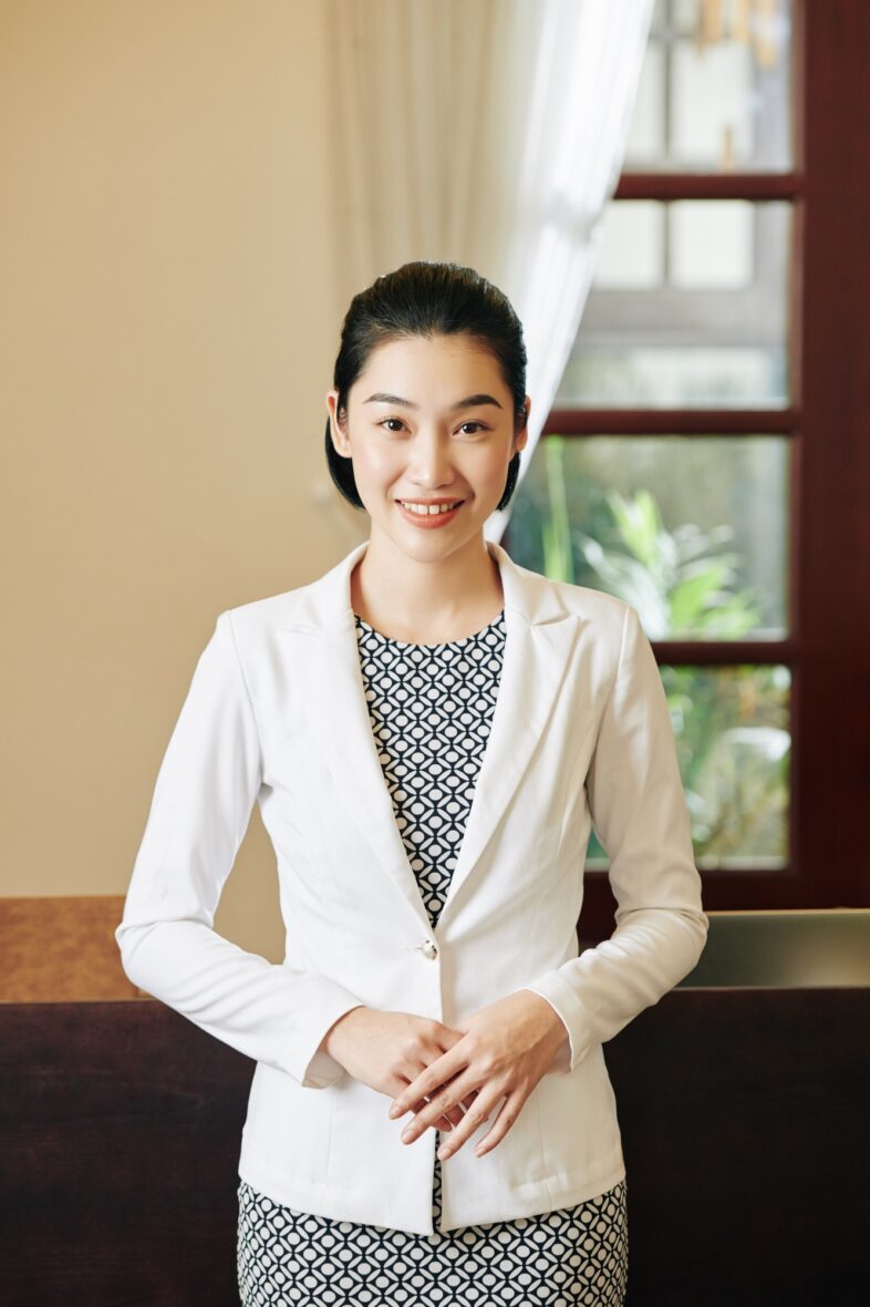 Smiling hotel receptionist