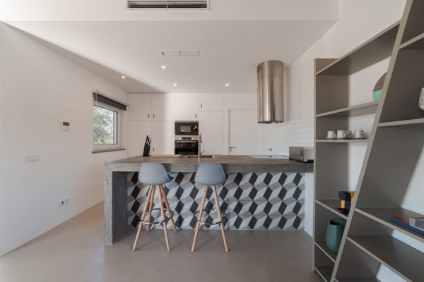 Kitchen balcony in modern villa with pool and deck