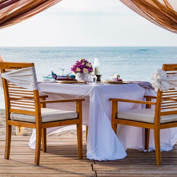 Romantic dinner setting on the beach